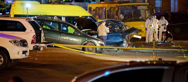 Криминалисты и сотрудники чрезвычайных служб работают на месте взрыва в столице Грузии - Sputnik Грузия