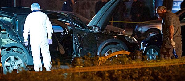 Криминалисты и сотрудники чрезвычайных служб работают на месте взрыва в центре грузинской столицы Криминалисты и сотрудники чрезвычайных служб работают на месте взрыва в центре грузинской столицы - Sputnik Грузия