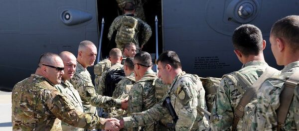 Грузинские военнослужащие отправляются в Афганистан Грузинские военнослужащие отправляются в Афганистан - Sputnik Грузия