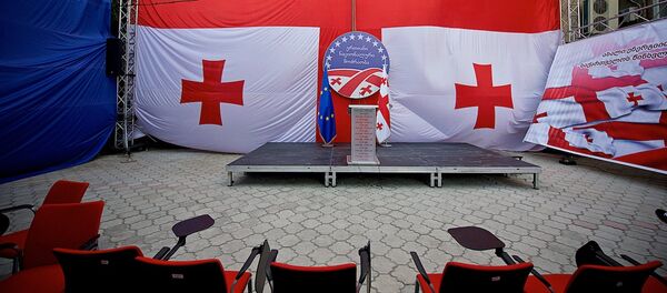 სცენა ნაცმოძრაობის ცენტრალურ ოფისში სცენა ნაცმოძრაობის ცენტრალურ ოფისში - Sputnik საქართველო