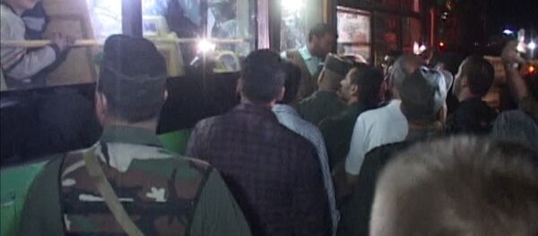 Сирийцы песнями встречали автобусы с жителями восточного Алеппо - Sputnik Грузия