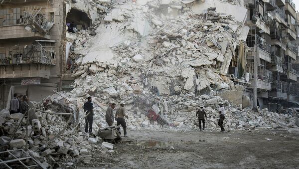 Разрушенные дома в Алеппо после боев сирийской армии с боевиками ИГ - Sputnik Грузия