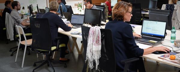 თანამშრომლები ოფისში თანამშრომლები ოფისში - Sputnik საქართველო