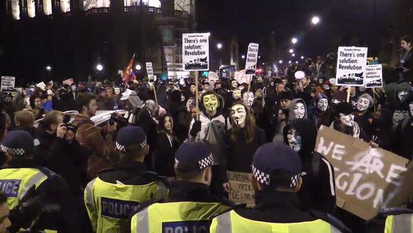 Сторонники хакерского движения Anonymous прошли маршем по центру Лондона - Sputnik Грузия