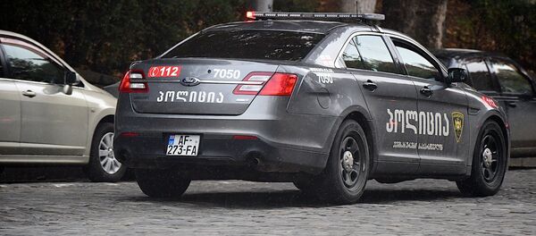 Полицейская машина патрулирует улицы грузинской столицы - Sputnik Грузия