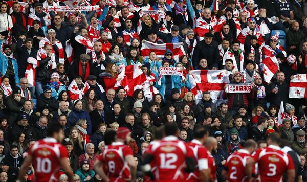 Грузинские болельщики во время игры сборных Грузии и Шотландии на стадионе Регби парк в городе Килмарнок - Sputnik Грузия