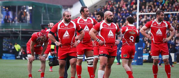 Капитан сборной Грузии Мамука Горгодзе (в центре) и игроки грузинской команды во время матча со сборной Шотландии Капитан сборной Грузии Мамука Горгодзе (в центре) и игроки грузинской команды во время матча со сборной Шотландии - Sputnik Грузия