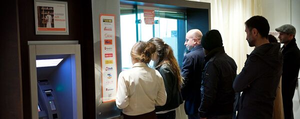 ბანკის სალაროსთან ბანკის სალაროსთან - Sputnik საქართველო