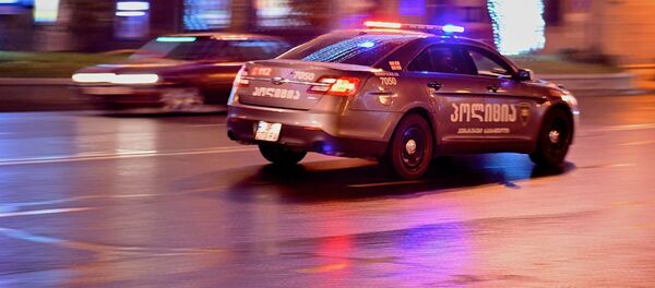 Полицейсккая машина зимой патрулирует улицы столицы Грузии - Sputnik Грузия