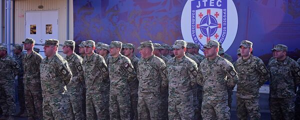 Грузинские военнослужащие в учебном центре Грузия-НАТО JTEC на территории военной базы в Крцаниси Грузинские военнослужащие в учебном центре Грузия-НАТО JTEC на территории военной базы в Крцаниси - Sputnik Грузия