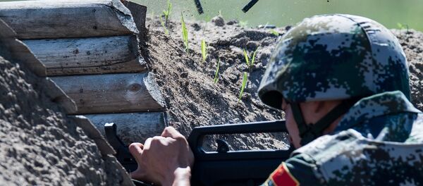 Военнослужащий армии Китая на огневом рубеже на международном конкурсе Рембат - Sputnik Грузия