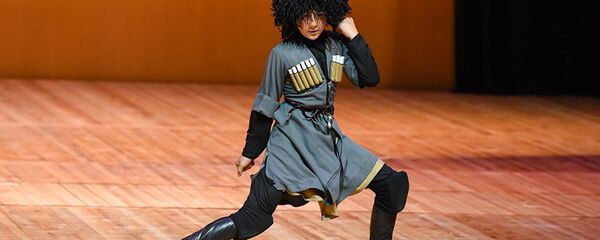 Танцоры ансамбля Martve являются воспитанниками легендарного Национального балета Грузии Сухишвили Танцоры ансамбля Martve являются воспитанниками легендарного Национального балета Грузии Сухишвили - Sputnik Грузия