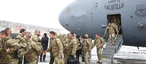 Грузинские военнослужащие вернулись из Афганистана Грузинские военнослужащие вернулись из Афганистана - Sputnik Грузия