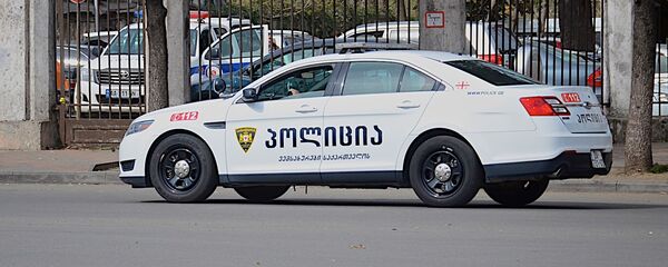 პოლიციის მანქანა ბათუმში, შსს-ს შენობის წინ პოლიციის მანქანა ბათუმში, შსს-ს შენობის წინ - Sputnik საქართველო