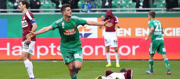 Нападающий сборной Грузии и венского Рапида Георгий Квилитая Нападающий сборной Грузии и венского Рапида Георгий Квилитая - Sputnik Грузия