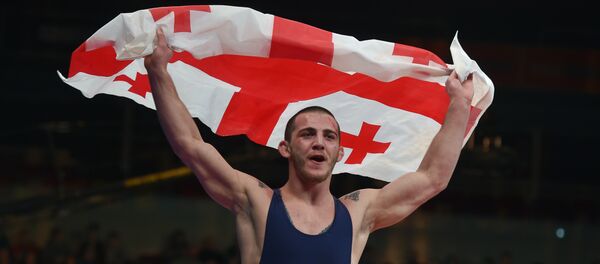 Зураб Датунашвили из Грузии празднует победу в финальном матче категории 75 кг на чемпионате Европы по греко-римской борьбе в Риге, Латвия Зураб Датунашвили из Грузии празднует победу в финальном матче категории 75 кг на чемпионате Европы по греко-римской борьбе в Риге, Латвия - Sputnik Грузия