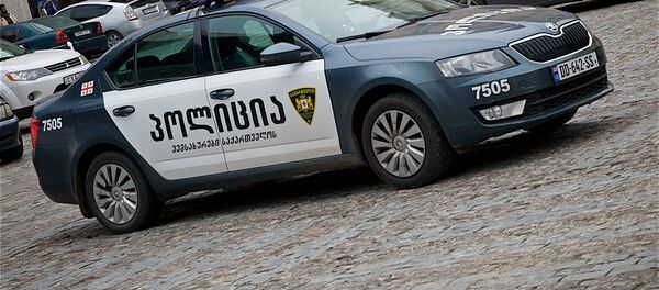 Полицейская машина в центре грузинской столицы - Sputnik Грузия