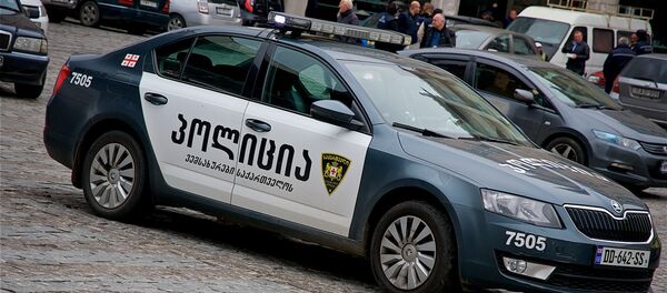 Полицейская машина в центре грузинской столицы - Sputnik Грузия