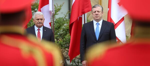 საქართველოსა და თურქეთის პრემიერ-მინისტრები გიორგი კვირიკაშვილი და ბინალი ილდირიმი საქართველოსა და თურქეთის პრემიერ-მინისტრები გიორგი კვირიკაშვილი და ბინალი ილდირიმი - Sputnik საქართველო