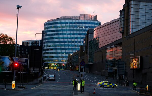 Вид на стадион Манчестер Арена, где произошел теракт, в лучах восходящего солнца - Sputnik Грузия