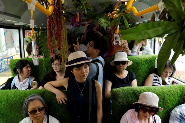ტაივანში მწვანე ავტობუსს მგზავრები სპეციალური მარშრუტით მიჰყავს მწვანე ნარგავების ქალაქებში ინტეგრაციის კონცეფციის გათვალისწინებით - Sputnik საქართველო