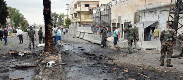 Разрушения в сирийском городе Хомс в результате боев с ИГ - Sputnik Грузия