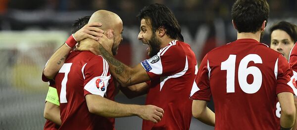 Игроки сборной Грузии радуются после забитого гола в матче против команды Германии - Sputnik Грузия