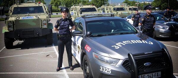 Сотрудники грузинской полиции на параде в честь Дня полиции - Sputnik Грузия