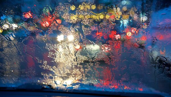 Машины на дорогах в сильный дождь - Sputnik Грузия