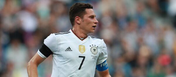 Капитан сборной Германии по футболу Юлиан Дракслер Капитан сборной Германии по футболу Юлиан Дракслер - Sputnik Грузия