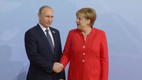 Как лидеры России и Германии приветствовали друг друга на саммите G20 - Sputnik Грузия