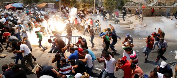 Трое палестинцев были убиты в ходе столкновений в Восточном Иерусалиме, где продолжаются протесты против новых мер безопасности на Храмовой горе - Sputnik Грузия