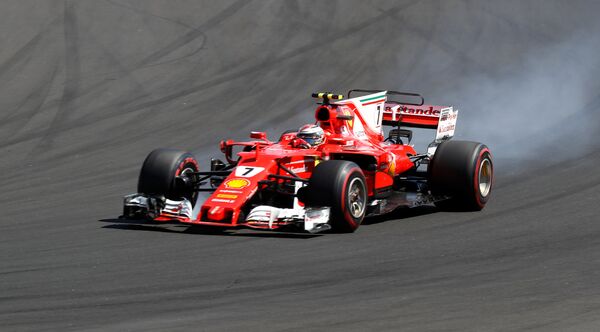 Гонщик Ferrari Кими Райкконен поднялся на вторую ступень подиума в Гран При Венгрии и стал Гонщиком дня по итогам голосования болельщиков - Sputnik Грузия