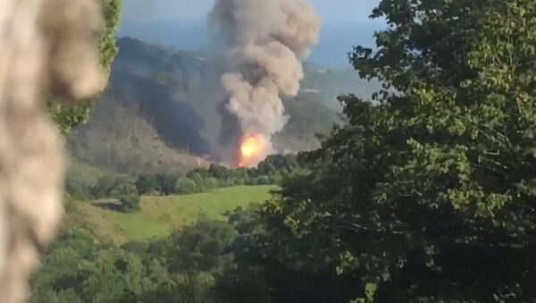 Кадры взрыва на складе боеприпасов в Абхазии - Sputnik Грузия