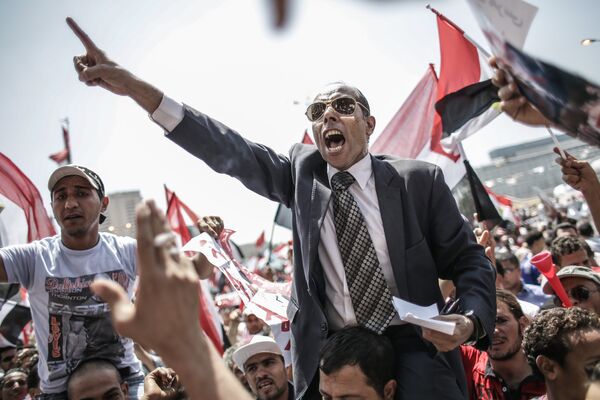 Противники президента Моххамеда Мурси на площади Тахрир, 2013 год - Sputnik Грузия