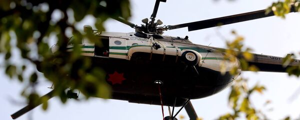 Вертолет Ми-8 пограничной службы МВД Грузии участвующий в тушении пожара в Боржоми-Харагаульском лесу Вертолет Ми-8 пограничной службы МВД Грузии участвующий в тушении пожара в Боржоми-Харагаульском лесу - Sputnik Грузия