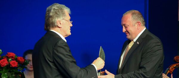 Экс-президент Украины Виктор Ющенко и президент Грузии Георгий Маргвелашвили в Польше - Sputnik Грузия