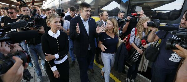 იულია ტიმოშენკო და მიხეილ სააკაშვილი იულია ტიმოშენკო და მიხეილ სააკაშვილი - Sputnik საქართველო