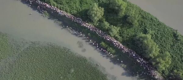 Тысячи беженцев рохинджа пытаются покинуть Мьянму на границе с Бангладеш - Sputnik Грузия