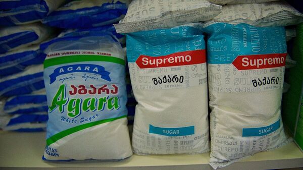 Сахар в килограммовых пачках на полках одного из продуктовых магазинов - Sputnik საქართველო