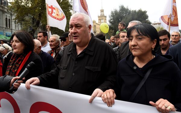 Во главе шествия идут лидеры политической организации - Sputnik Грузия