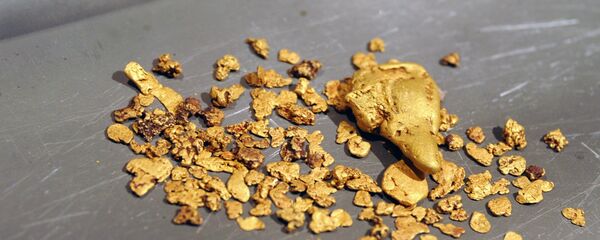 Золото, добытое на участке золотодобычи предприятия, фото из архива - Sputnik Грузия