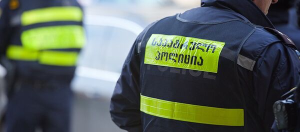 Сотрудники патрульной полиции - Sputnik Грузия