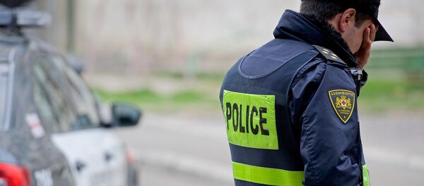 Сотрудники патрульной полиции - Sputnik Грузия