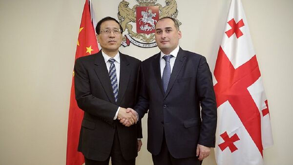 Президент Банка развития Китая Чень Юанем и министр экономики и устойчивого развития Грузии Дмитрий Кумсишвили - Sputnik Грузия