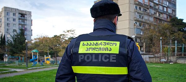 Сотрудник патрульной полиции - Sputnik Грузия