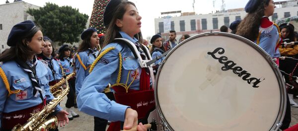 Шествие оркестров во время празднования Рождества возле церкви Рождества Христова в Вифлееме - Sputnik Грузия