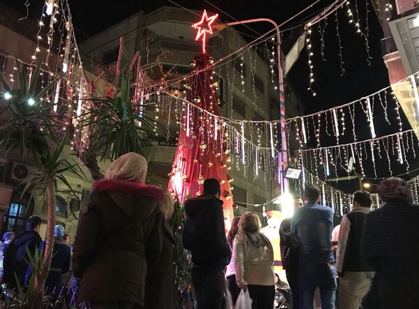 Рождественские гуляния в историческом центре Дамаска - в районах Баб-Шарки и Баб-Тума - Sputnik Грузия