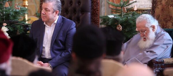 Премьер-министр Грузии Георгий Квирикашвили и Католикос-Патриарх Всея Грузии Илия Второй Премьер-министр Грузии Георгий Квирикашвили и Католикос-Патриарх Всея Грузии Илия Второй - Sputnik Грузия