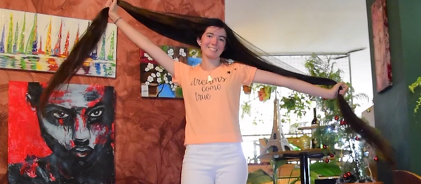 Рапунцель из Аргентины: девушка отрастила волосы длиной 1.53 м - Sputnik Грузия